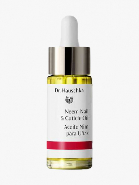Gold and silver detailed cuticle oil bottle with white top and label. 